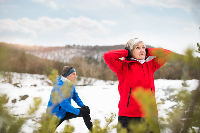 couple exercising in winter