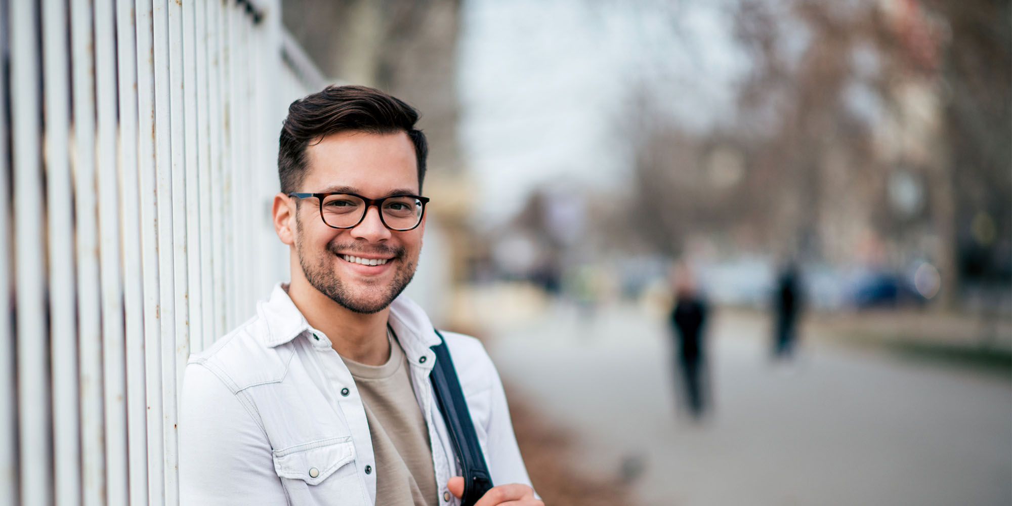 Man smiling outdoors