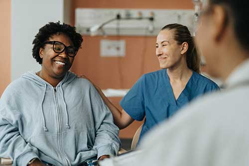 patient laughing with nurse