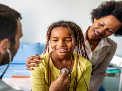 mom with child visiting the doctor