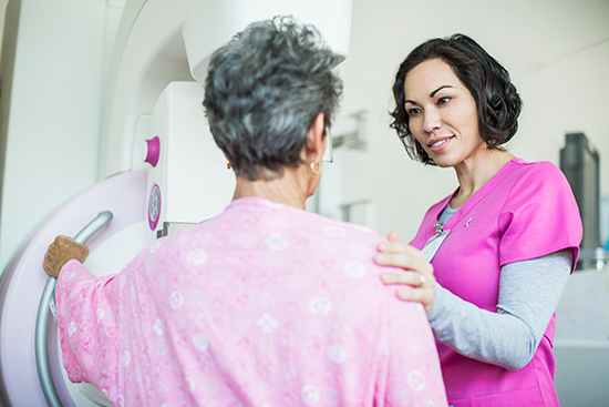 woman getting a mammogram